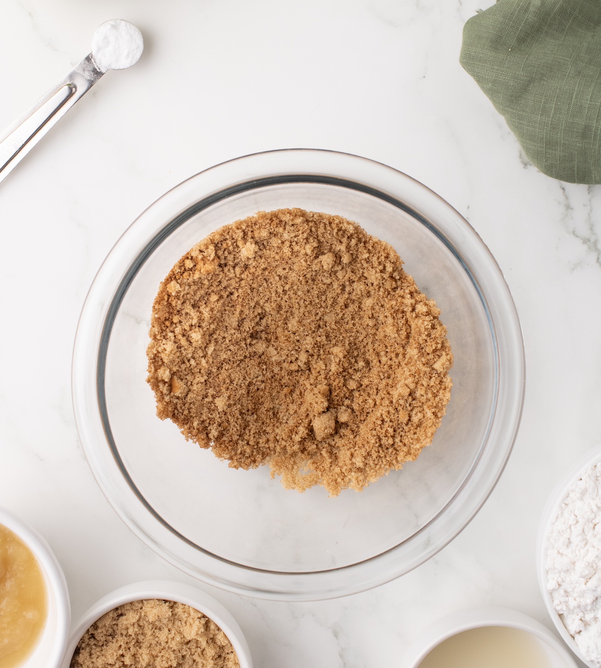 Cinnamon and brown sugar in a clear glass bowl