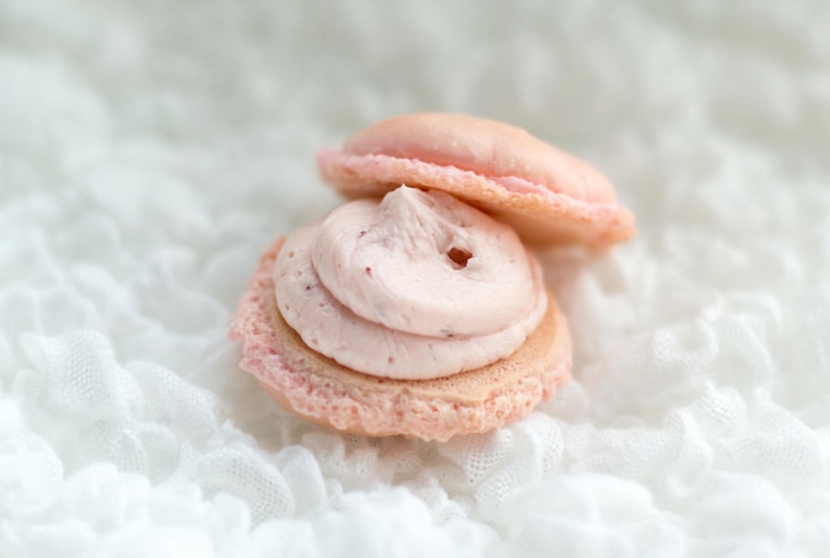 macaron topped with strawberry filling