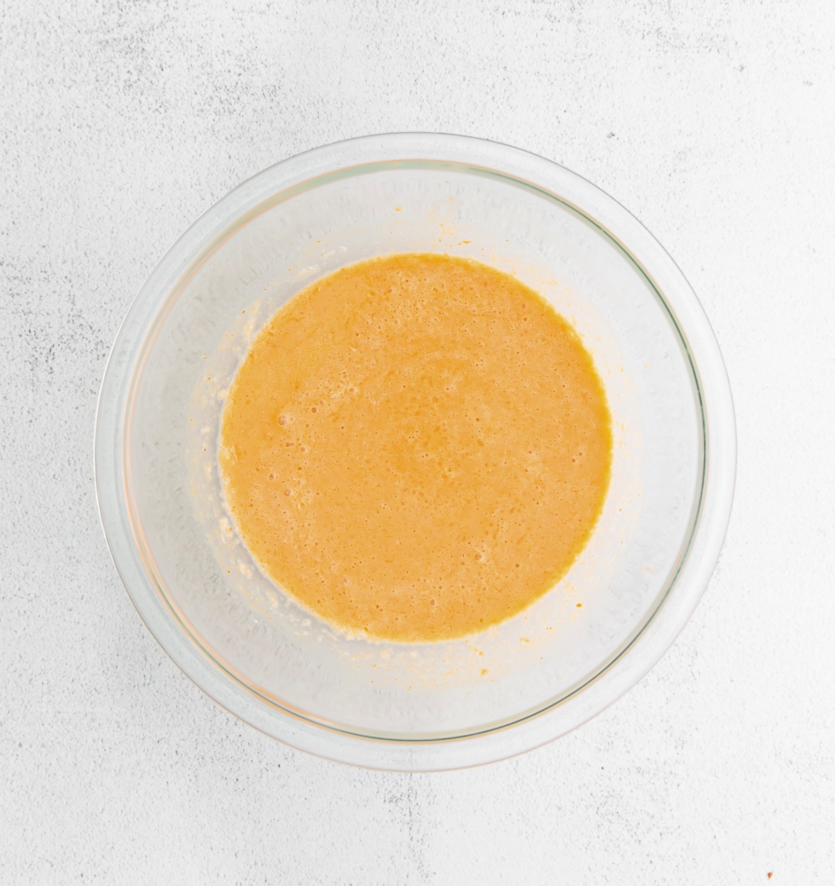 Mix together the milk, brown sugar, egg, pumpkin puree, melted butter, and vanilla extract