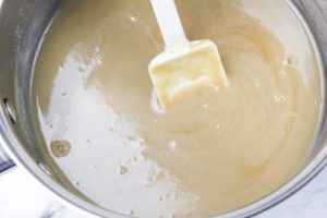 Cooking the half and half and brown sugar on the stove
