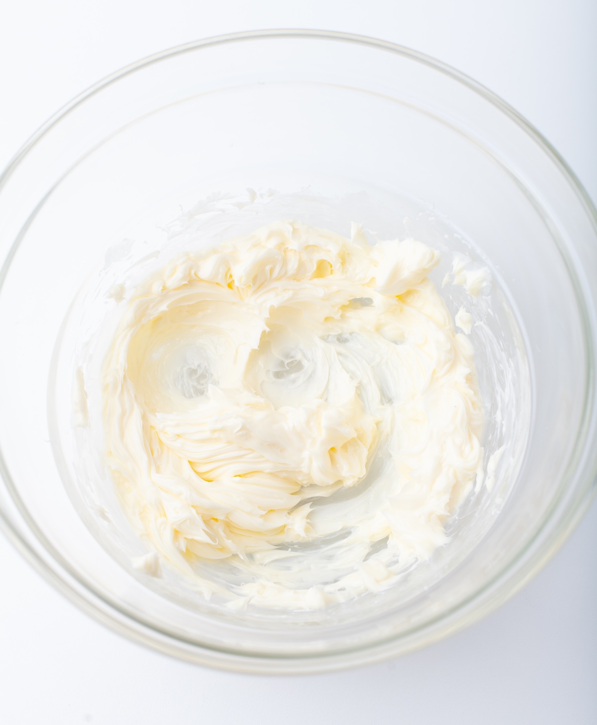 Creamed butter in a clear glass bowl