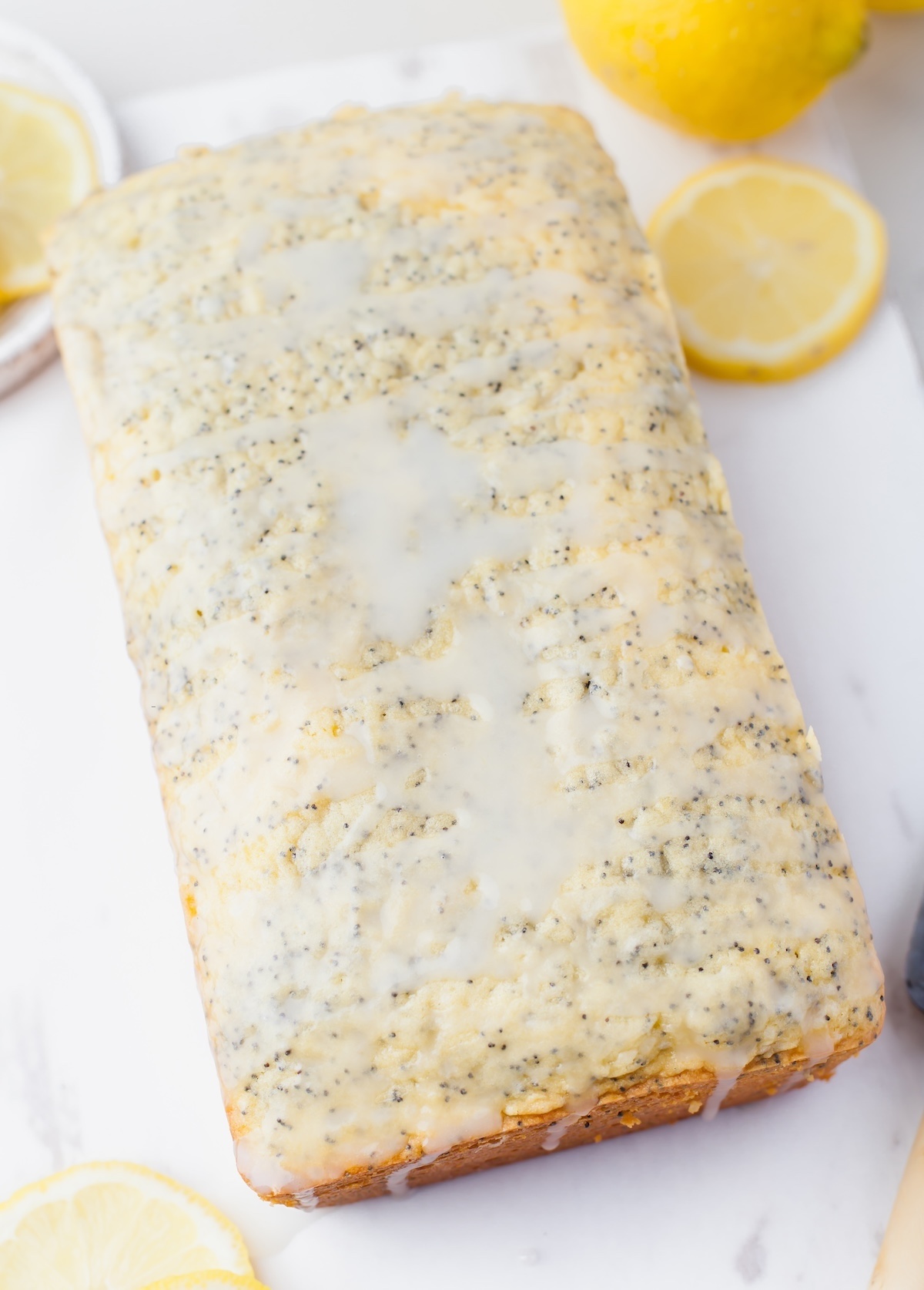 Lemon glaze drizzled over the top of the bread