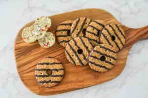 Reese's cups and Fudge stripe cookies on a cutting board