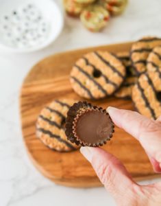 Unwrapping a Reese's cup