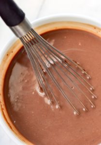 Whisking chocolate pudding