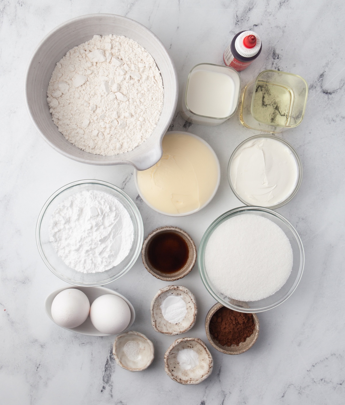flour, milk, baking soda, butter, vanilla, cocoa, salt, eggs, oil, cream cheese, sugar
