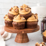 Snickers-cupcakes-on-a-cake-plate