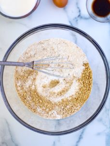 graham cracker crumbs, flour, baking powder, and brown sugar in a large glass bowl