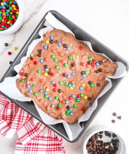 M&Ms sprinkled on top of the mixture