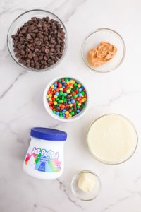 chocolate chips, M&Ms, marshmallow creme, peanut butter, butter, condensed milk