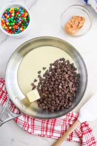 chocolate chips, condensed milk and butter in a bowl