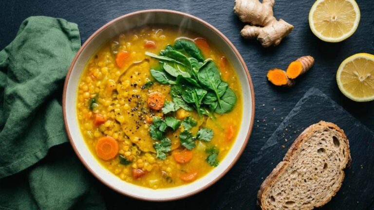 Anti-inflammatory soups: golden turmeric red lentil soup with spinach, ginger and lemon