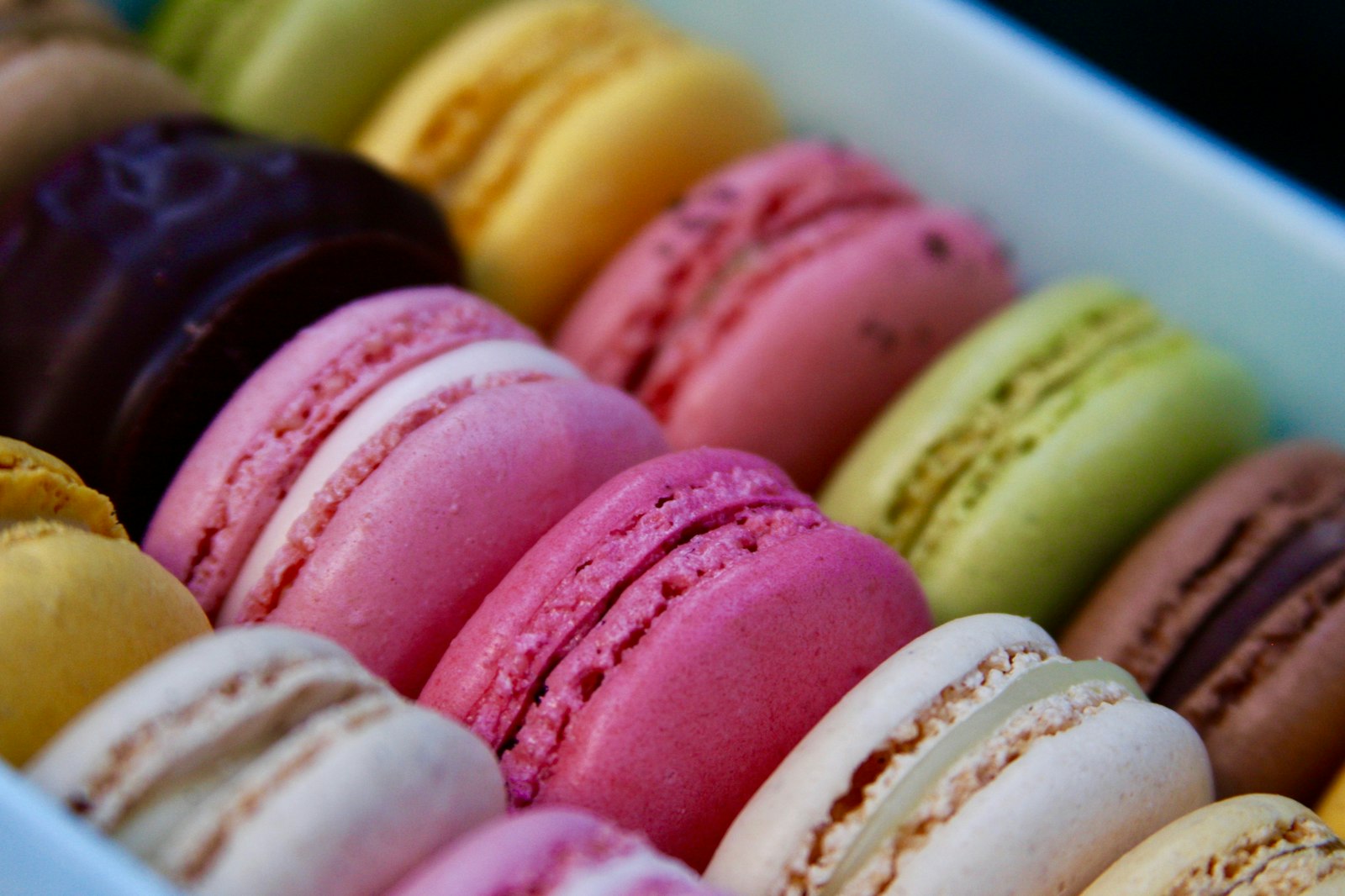 Box of assorted colorful French macarons