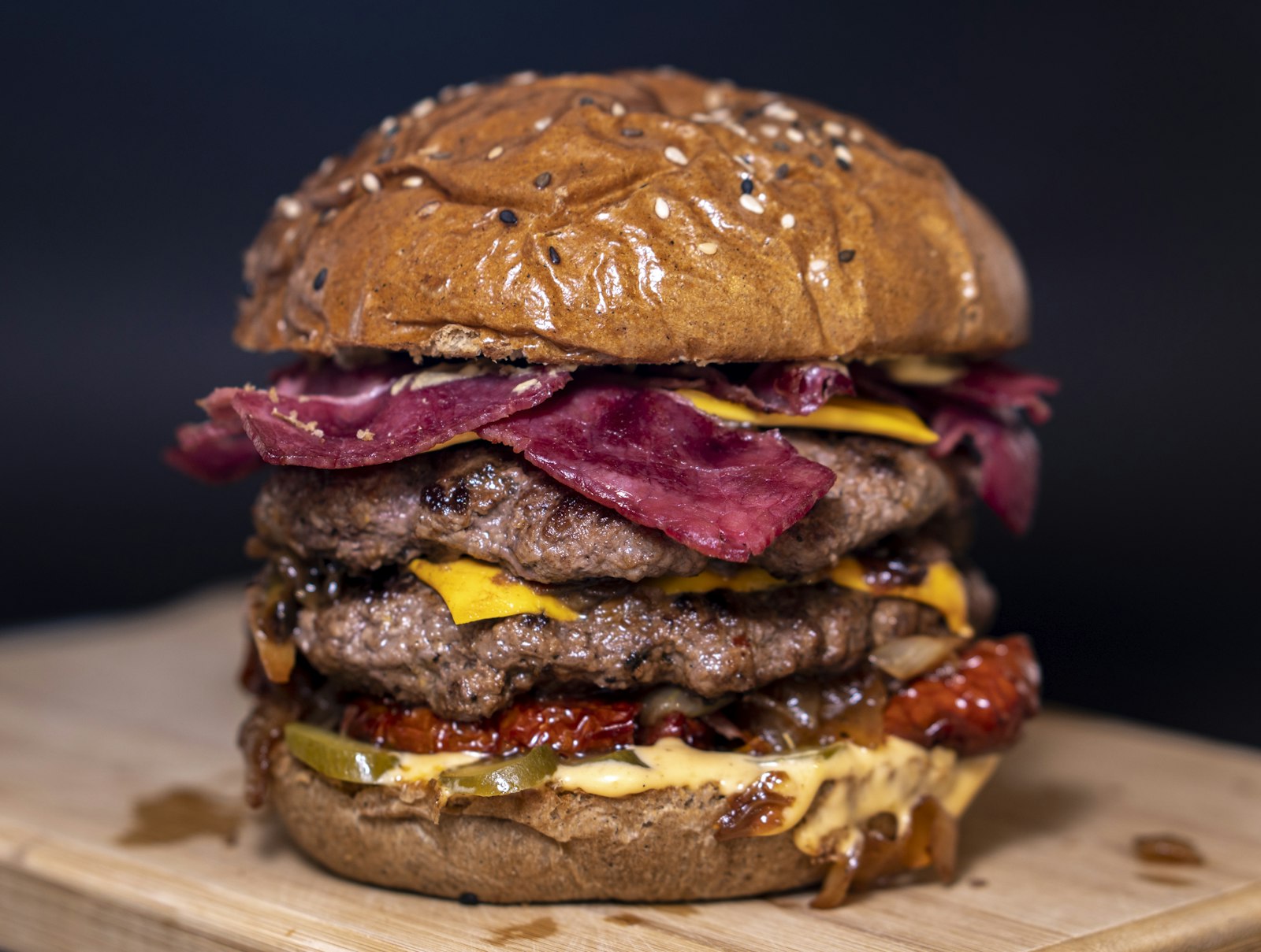 Stacked BBQ burger with onions