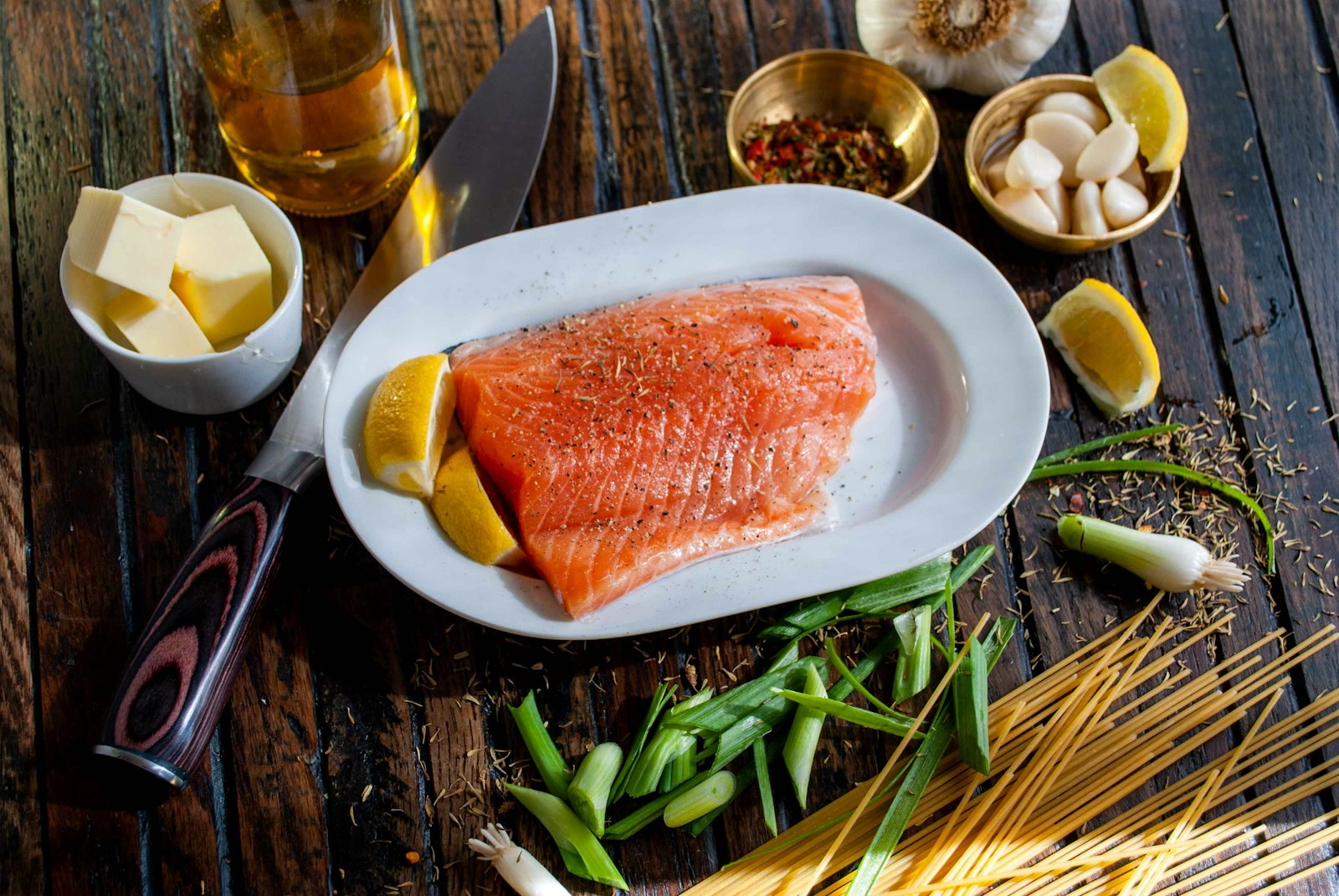 Raw salmon fillet on a board