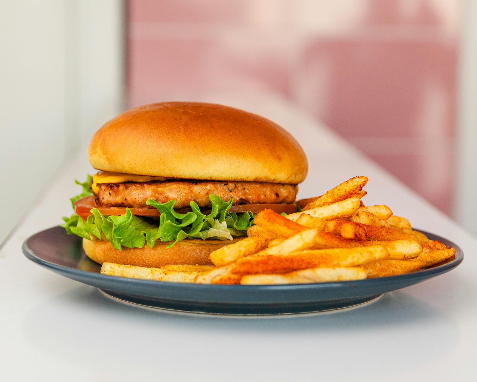 Crispy chicken burger with fries