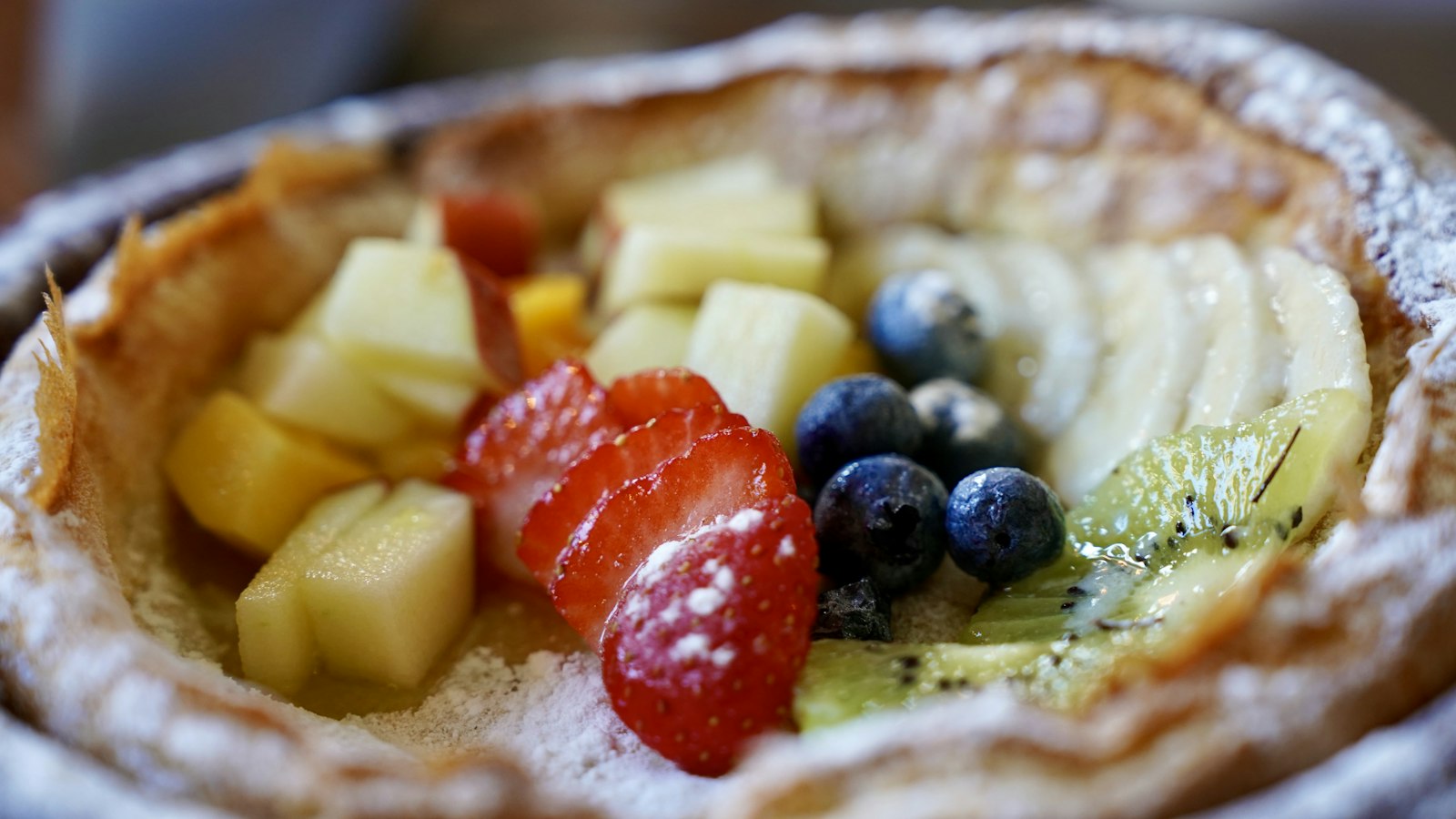 Dutch baby pancake topped with fresh fruit