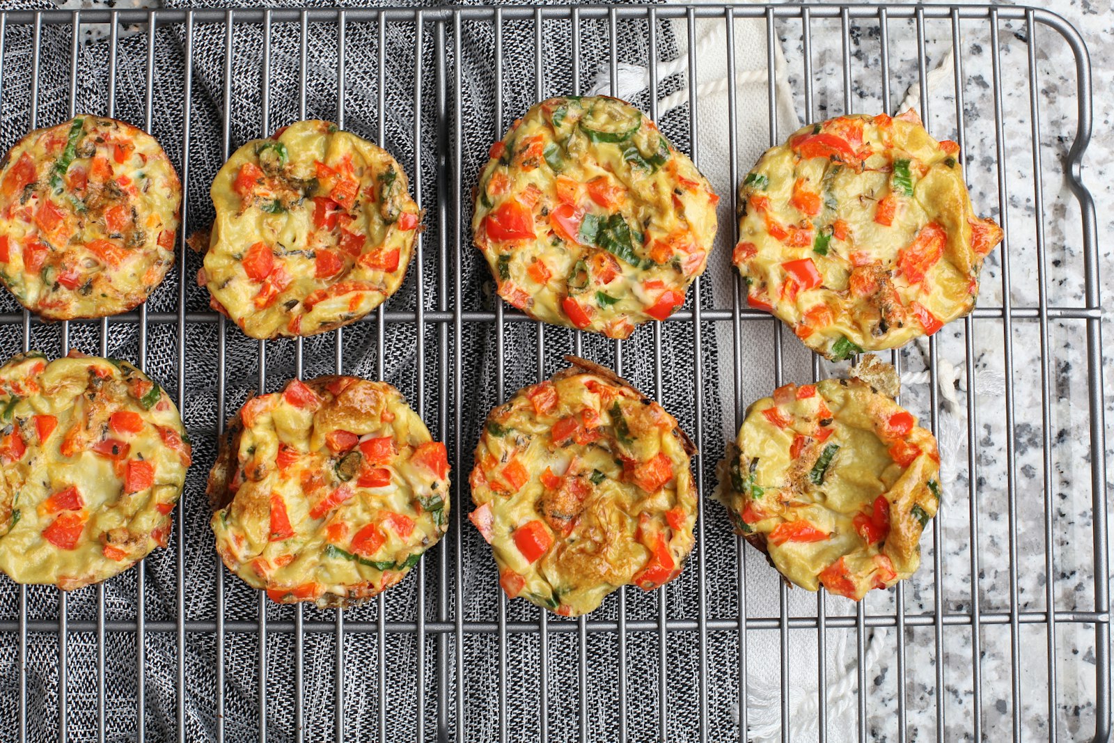 Baked egg muffins on a cooling rack