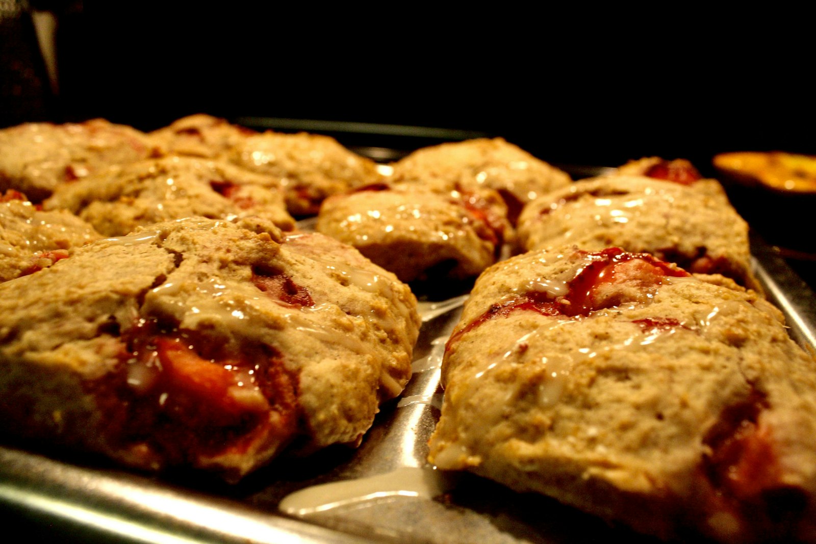 Golden scones baked with tart red berries