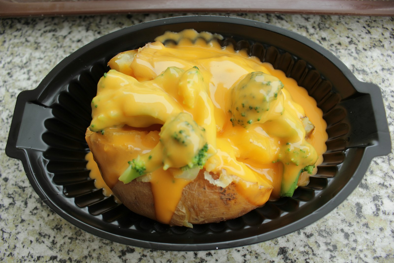 Cheesy chicken and broccoli casserole in a skillet