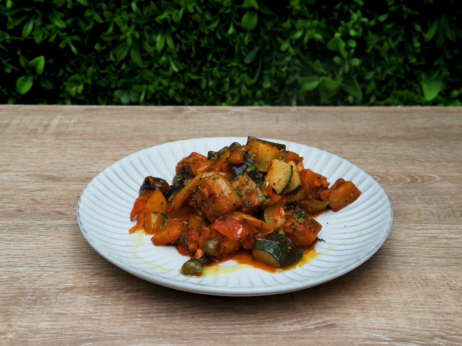 Chicken cacciatore with peppers in tomato sauce
