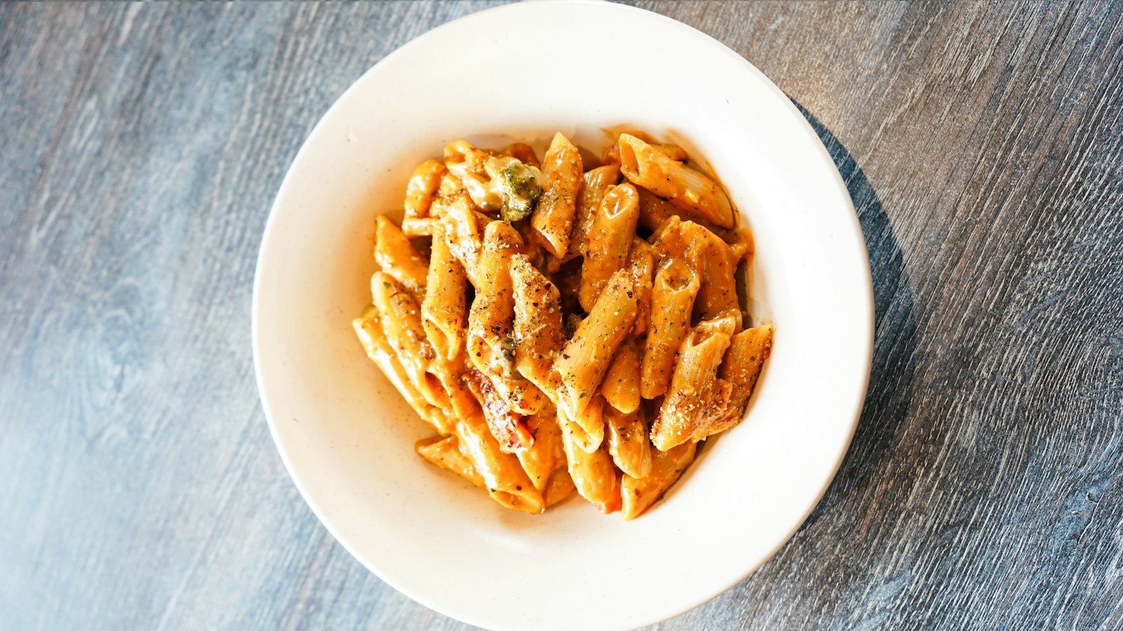 Freezer meals: baked ziti with tomato sauce in a bowl