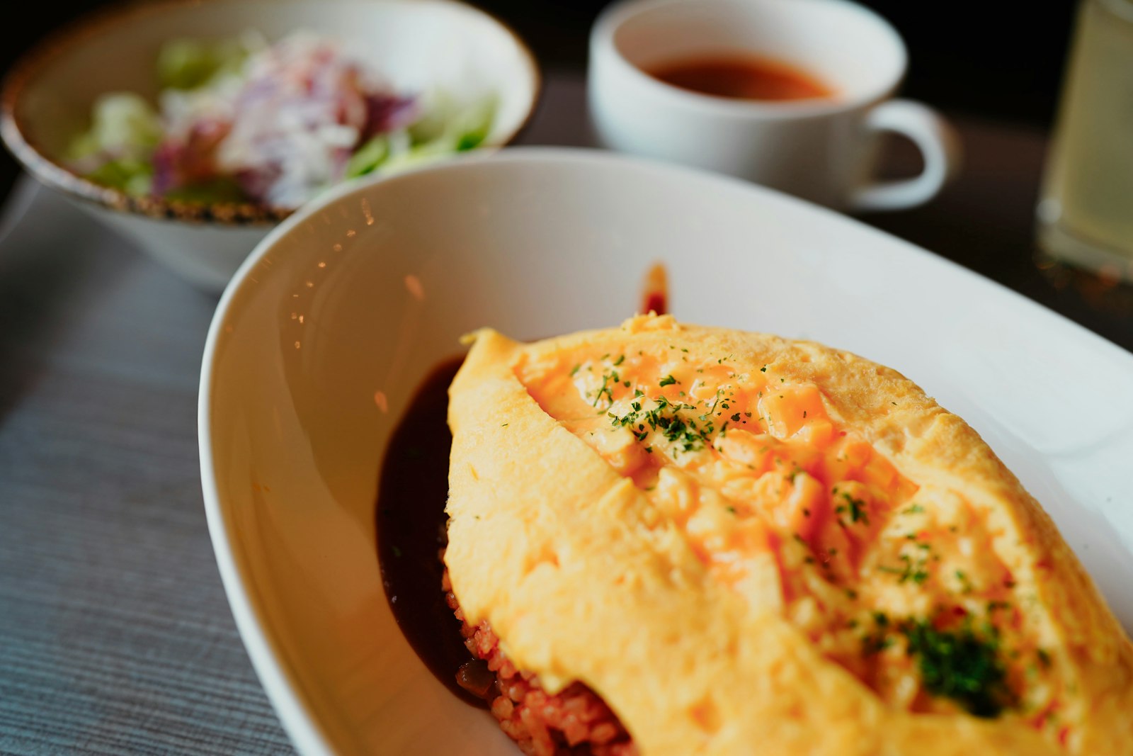 Japanese dinners: fluffy omurice omelet over fried rice