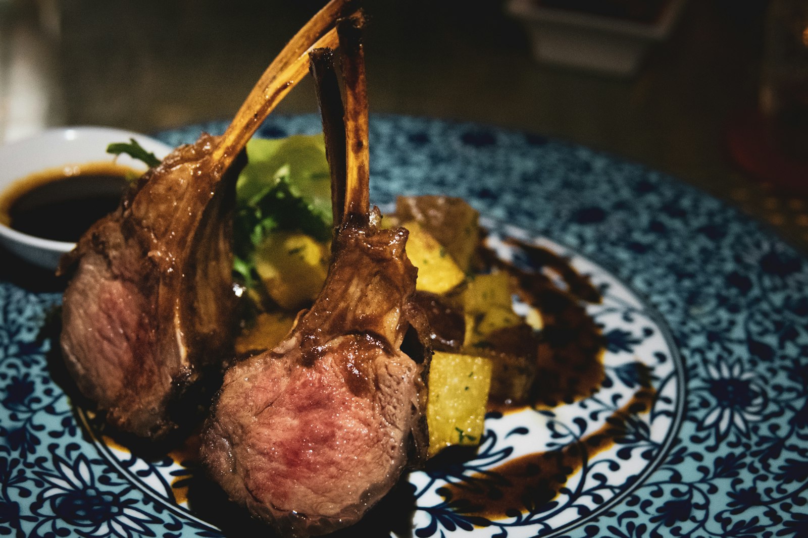 Seared lamb chops with rosemary on a plate
