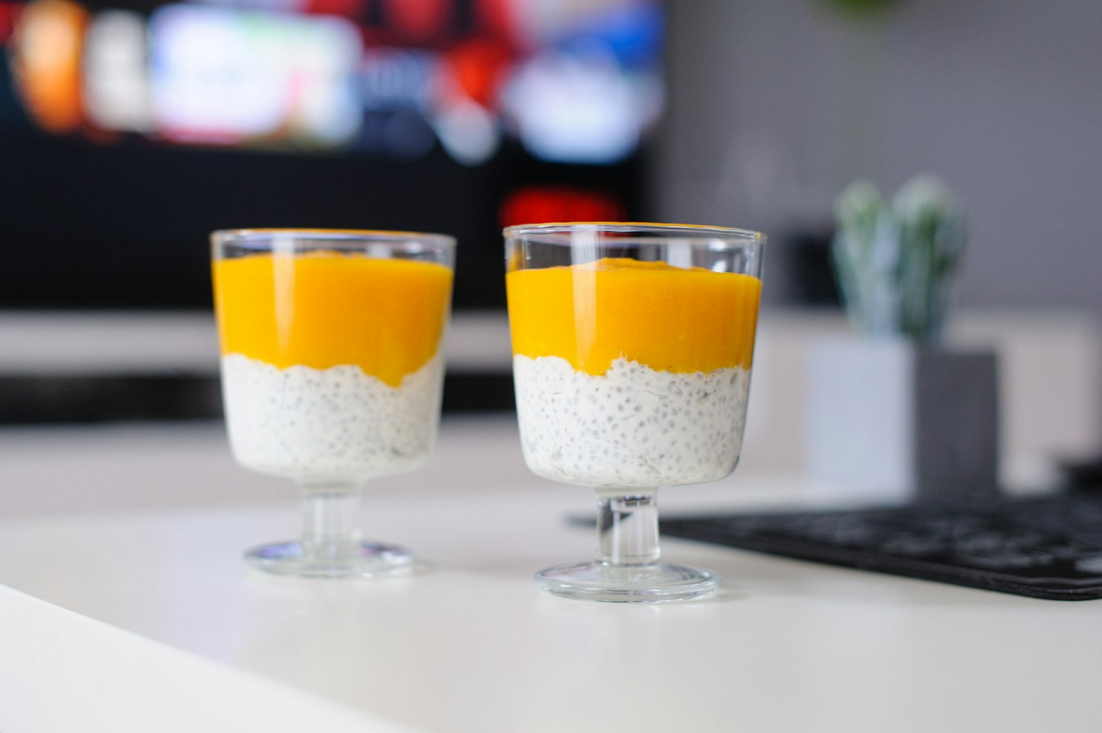 Layered coconut chia pudding in glasses