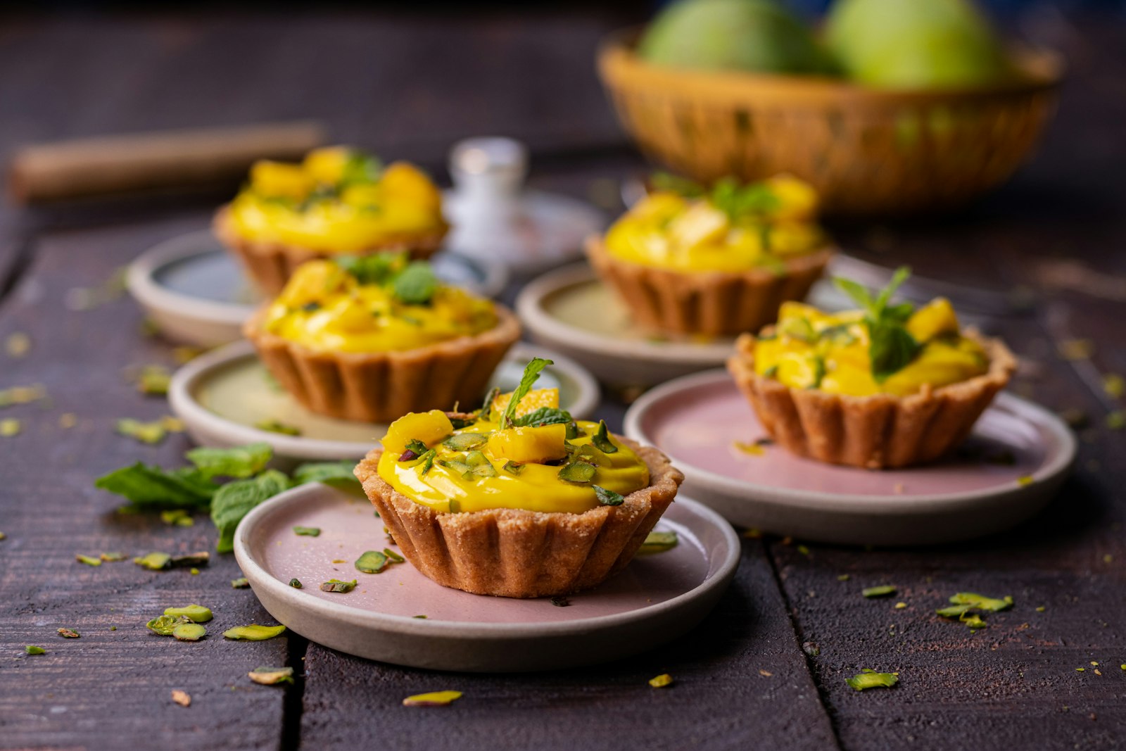 Mini mango tarts on a table