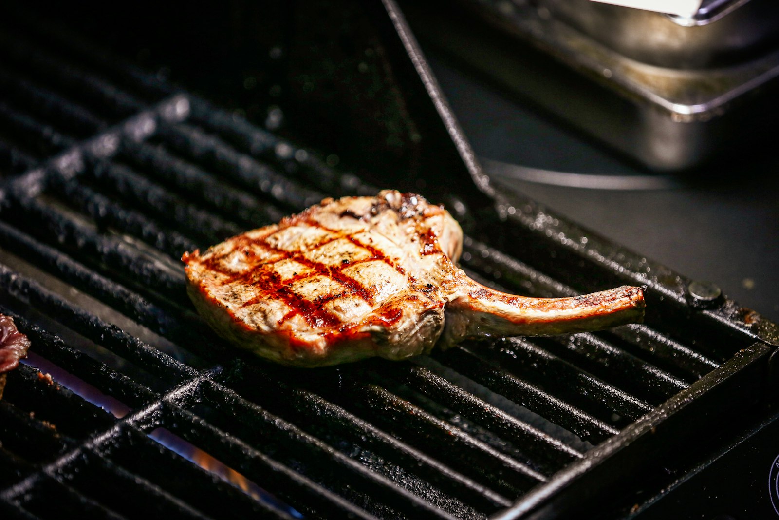 Thick grilled pork chop with grill marks