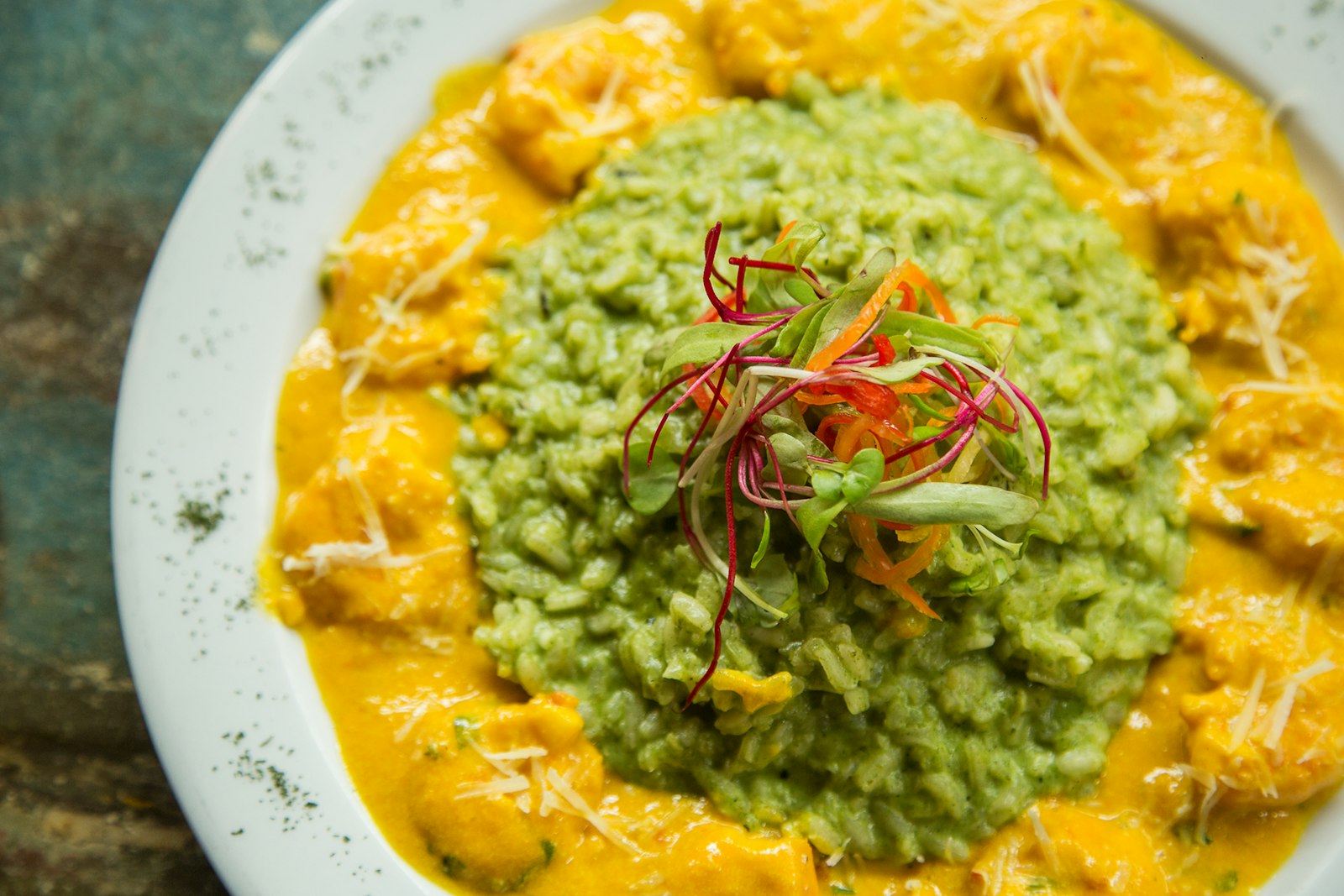 Pumpkin risotto topped with herbs, a cozy pumpkin dinner