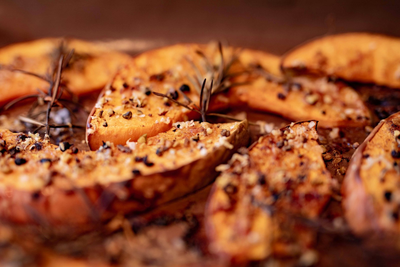 Spice roasted orange cubes with sesame seeds
