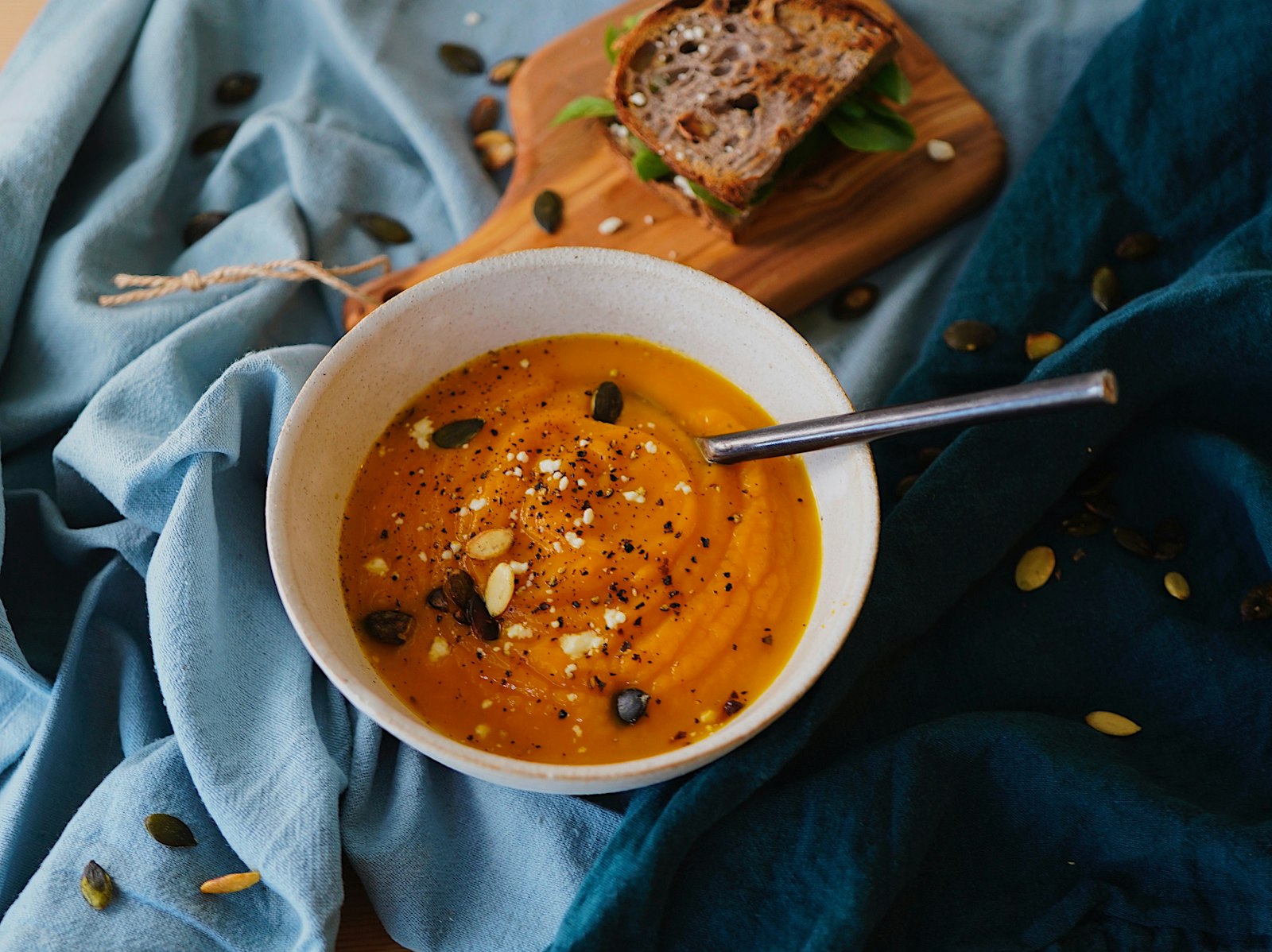 Sweet potato soup in a bowl with a spoon