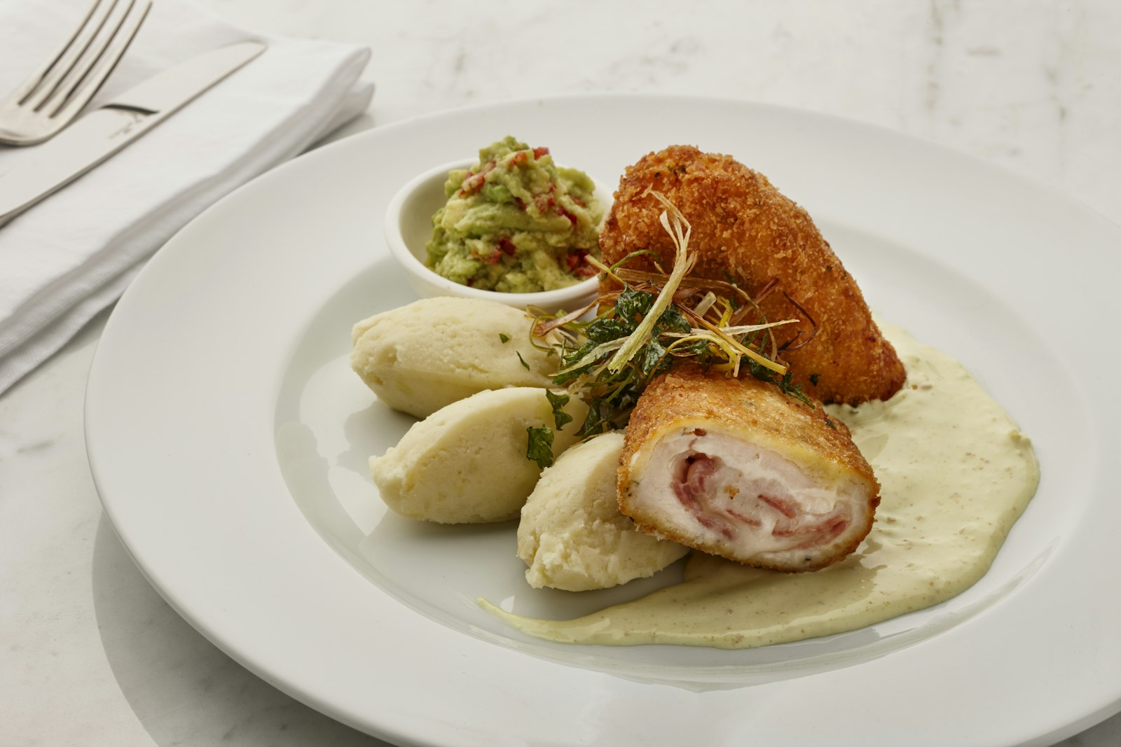 Stuffed dinners chicken cordon bleu sliced to show ham and cheese