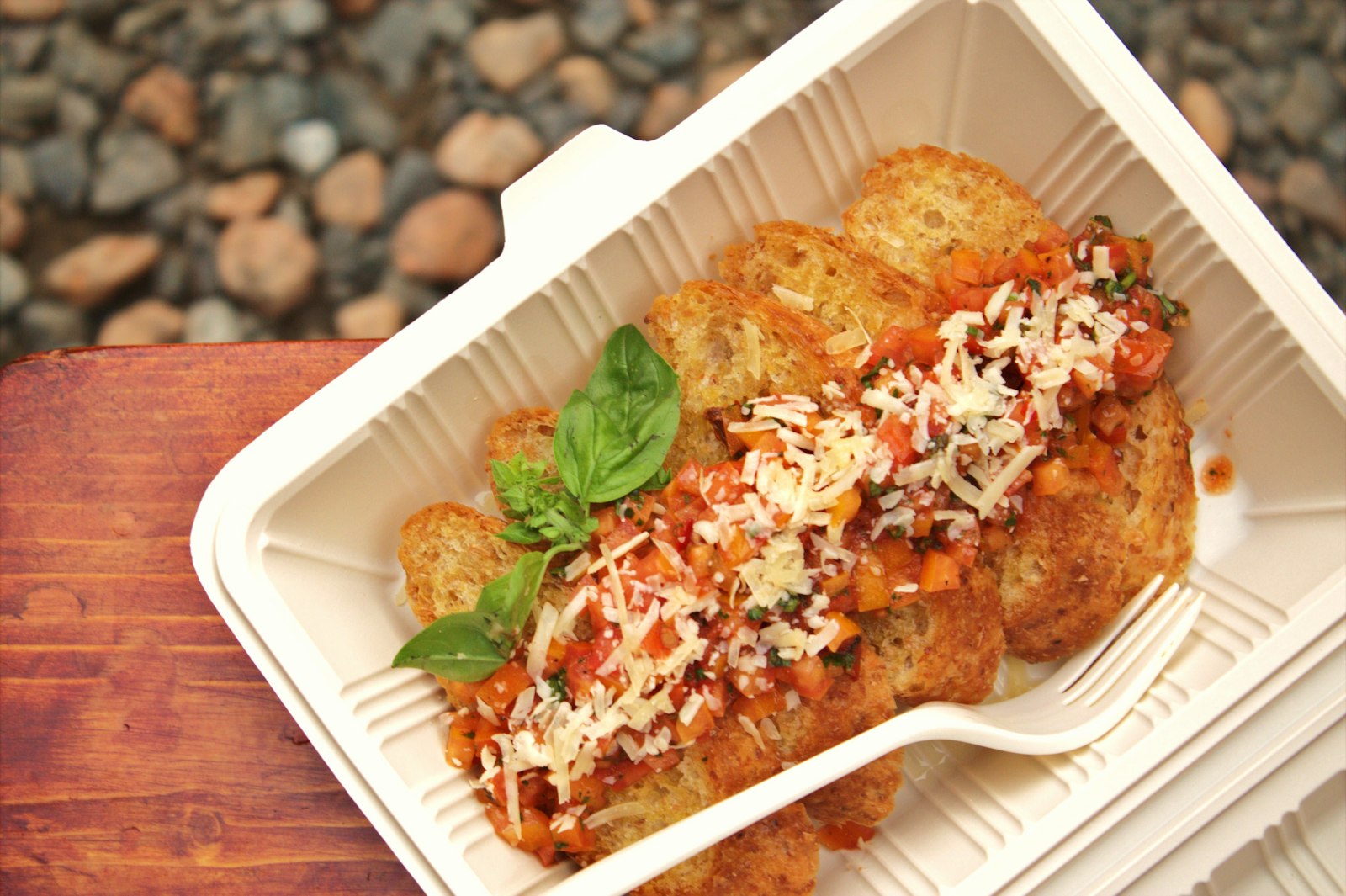 Baked manicotti with tomato sauce, cheese and basil