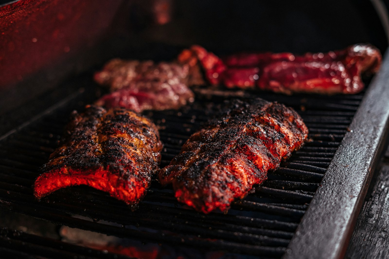 Big beef ribs cooking over the grill