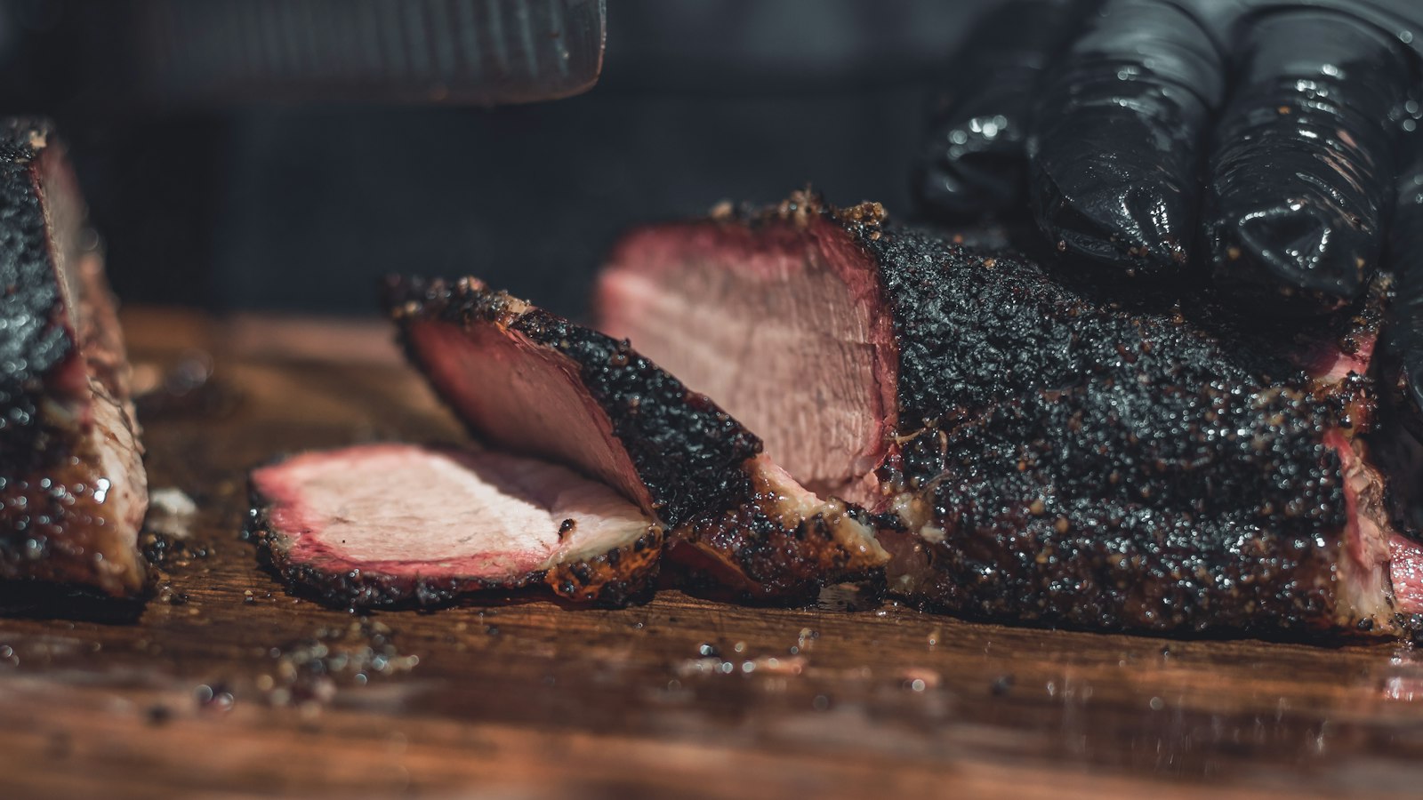 Sliced Texas style beef brisket with a dark pepper crust