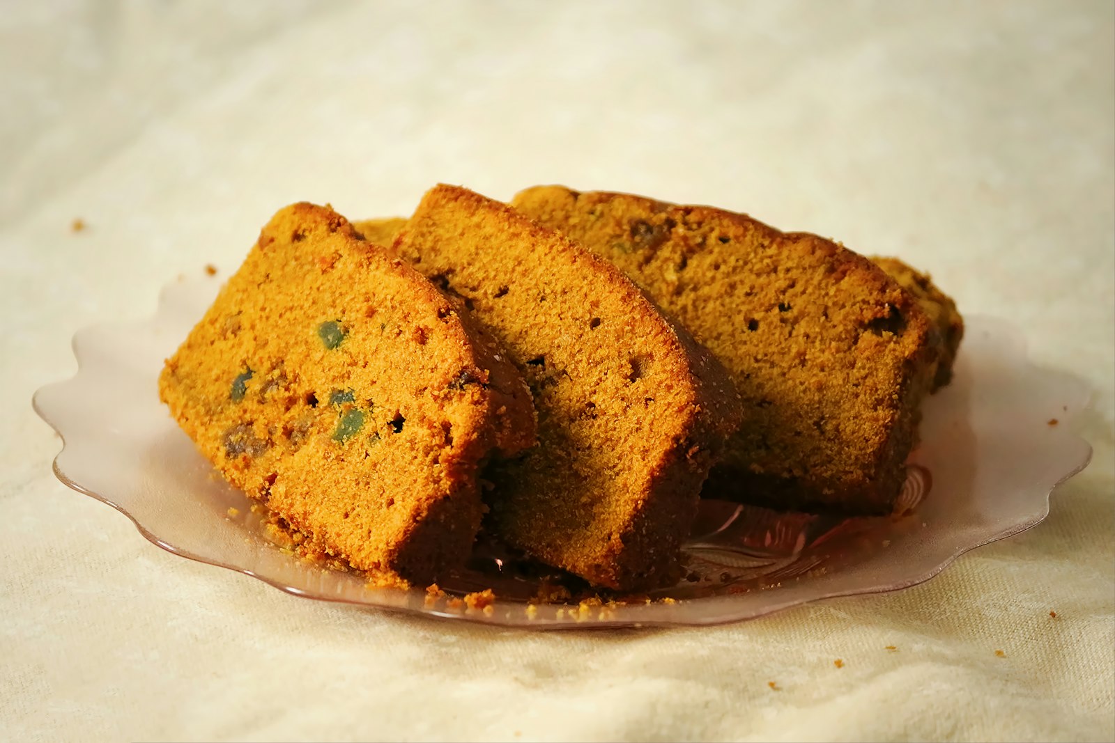 Slices of golden sweet cornbread on a plate