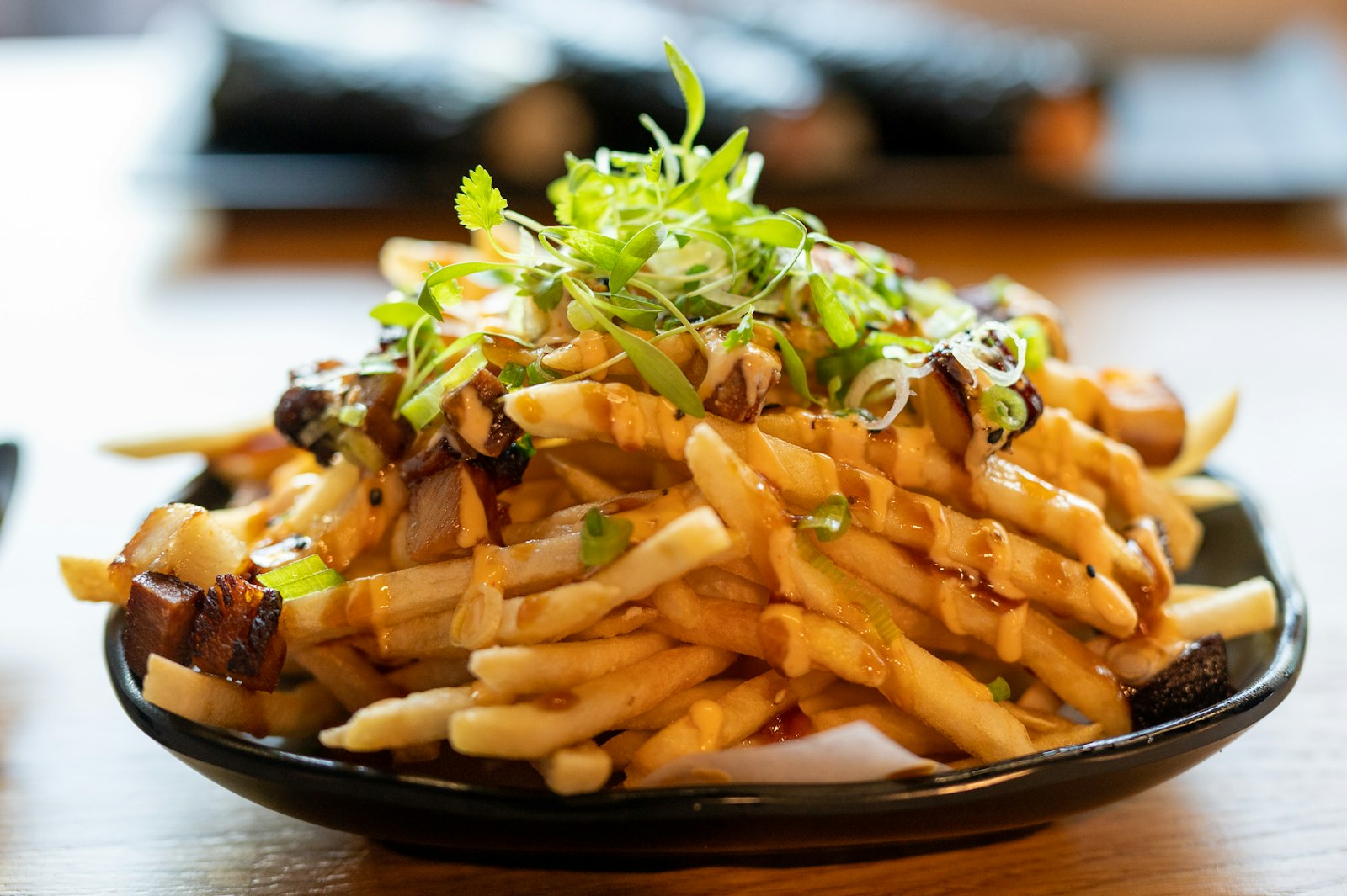 Loaded cheese fries topped with meat sauce