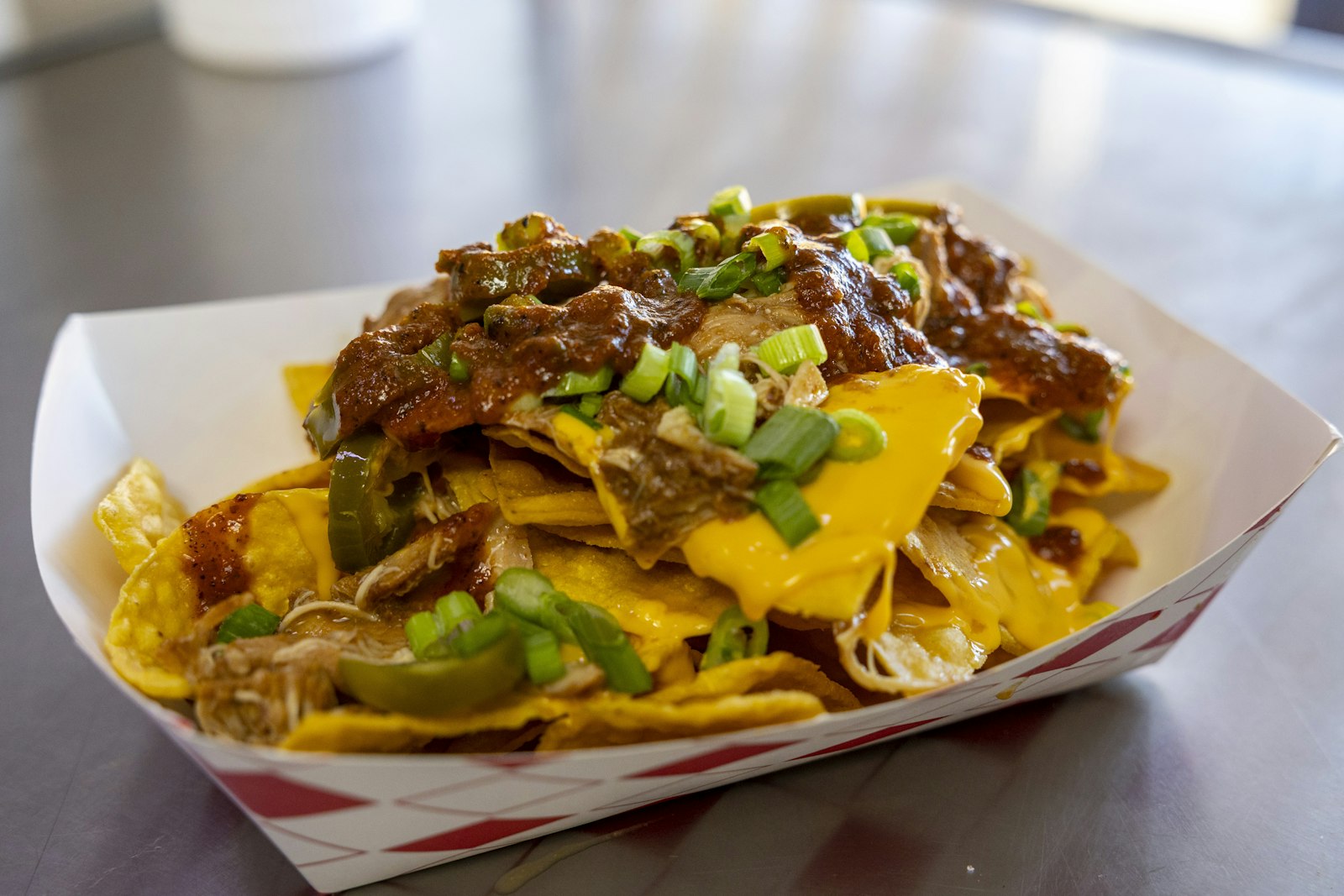 Cheesy loaded nachos with jalapenos