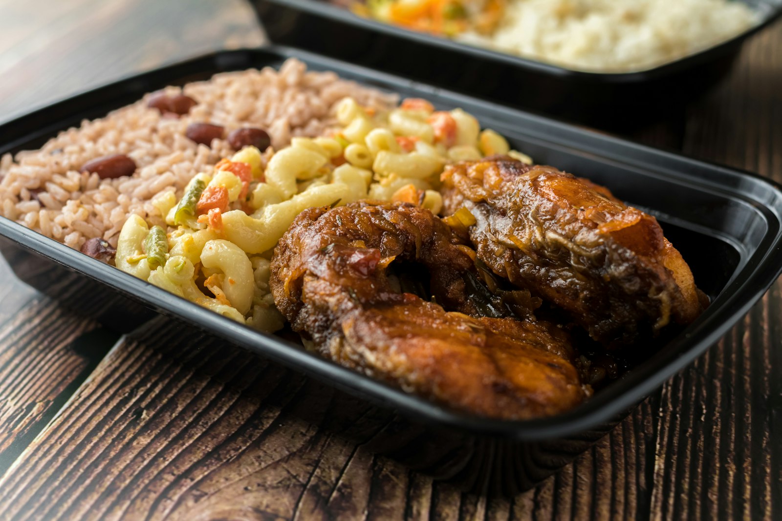 Caribbean macaroni pie with stew chicken