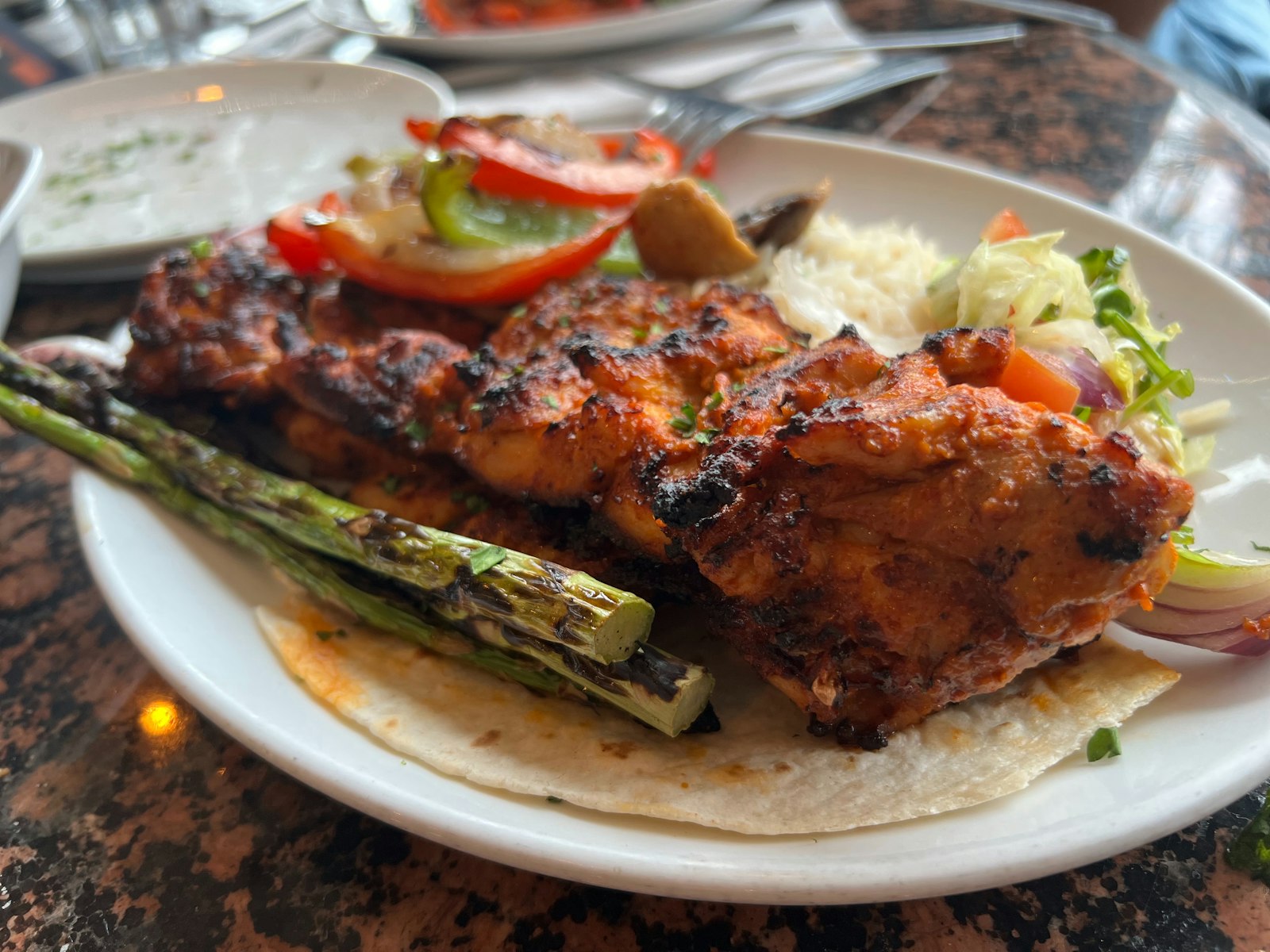 Blackened chicken breast with grilled vegetables