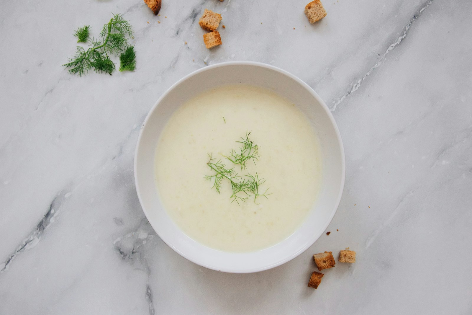 Creamy potato soup with herbs