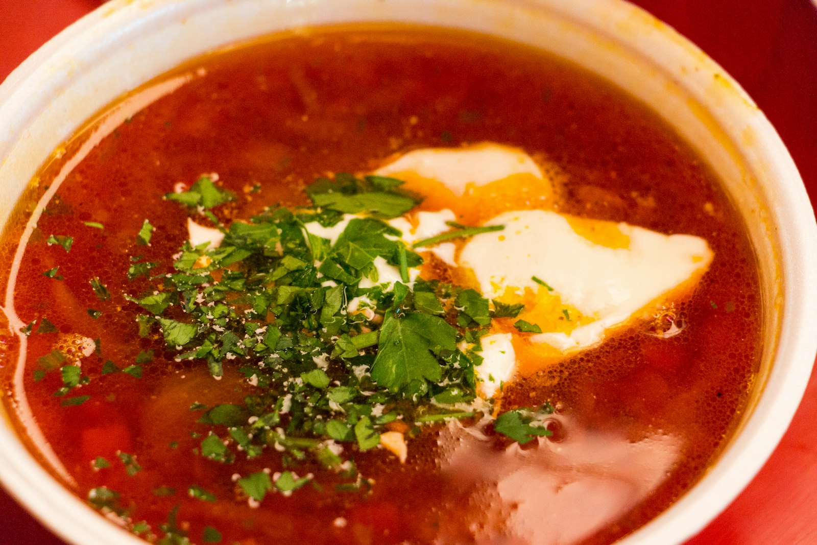 Eastern European red borscht with sour cream