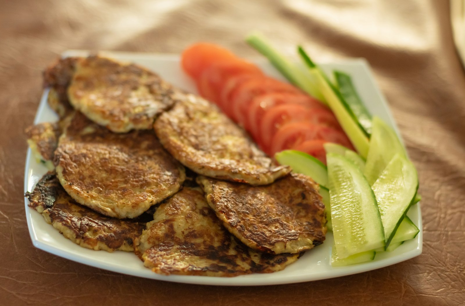 Crispy potato pancakes with sour cream