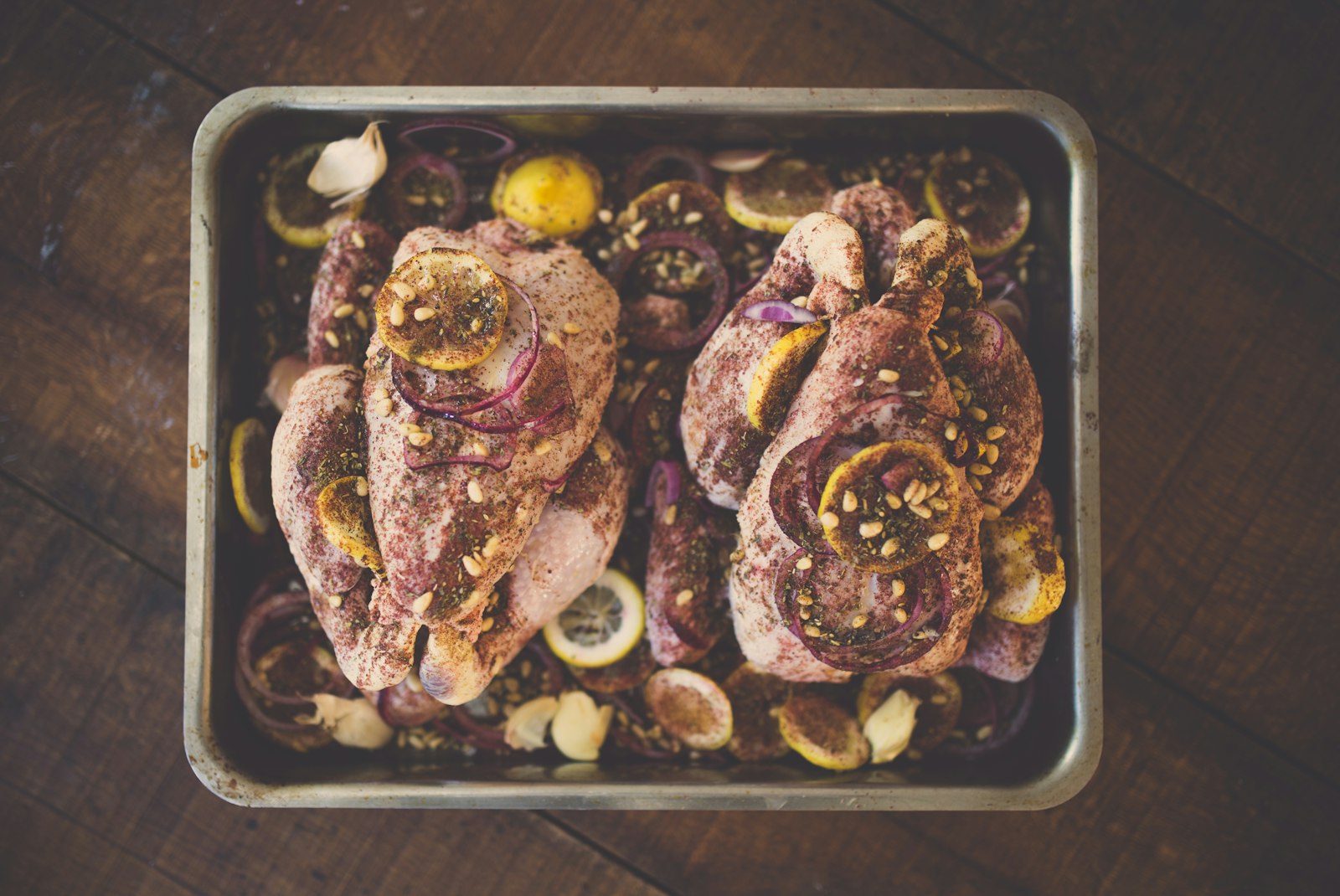 Spanish garlic chicken pieces in a baking tray
