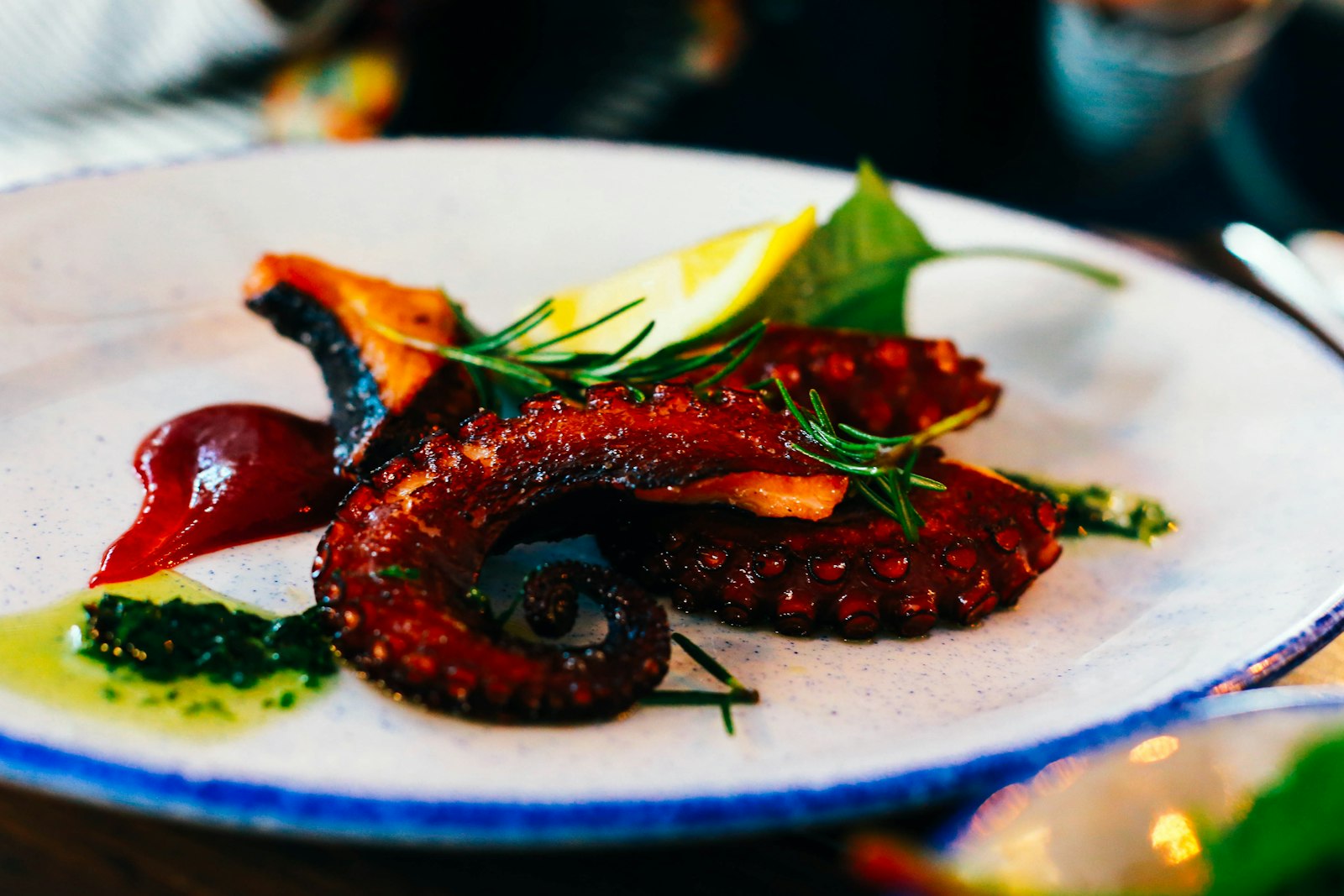 Plated octopus with paprika and olive oil
