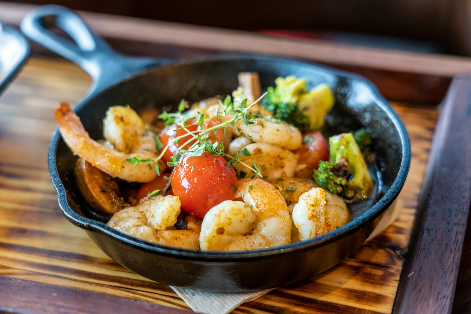 Spanish gambas al ajillo in a sizzling pan
