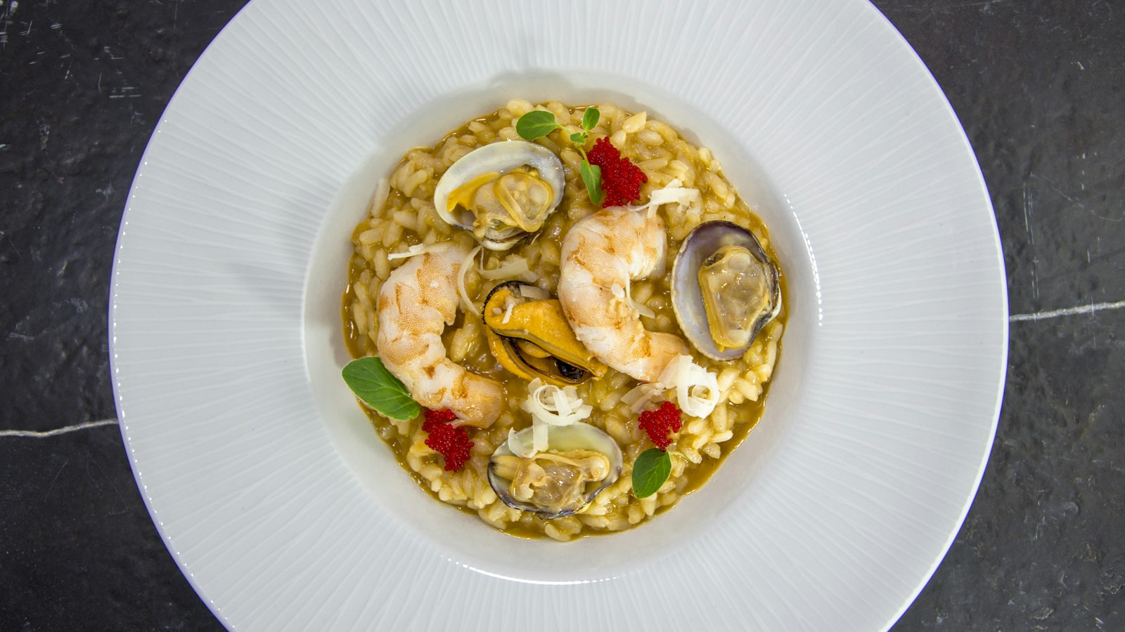 Seafood risotto with clams and herbs